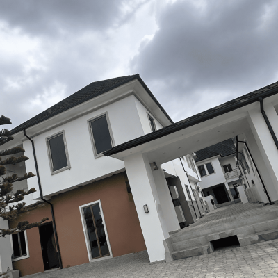 Two Smart 4-Bedroom Duplexes in GRA Phase 2: An Investment Overview